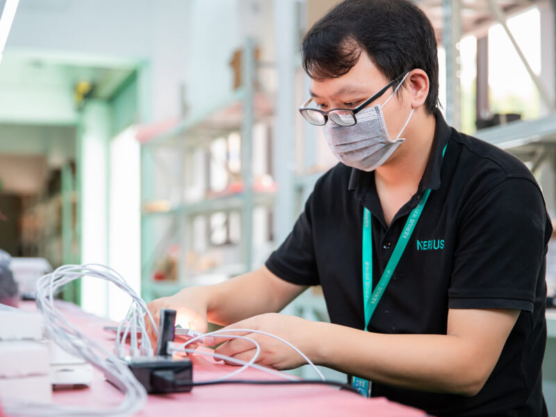 man testing the LED lights before assembly